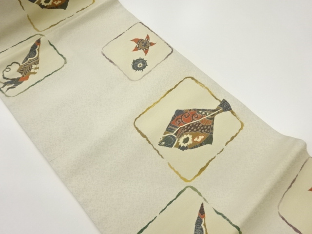 四角にヒラメ・イカ・ヒトデ模様織出し名古屋帯